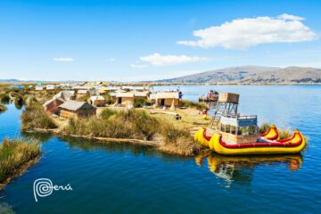 A pair of boats docked next to one of Lake Titicaca's floating islands