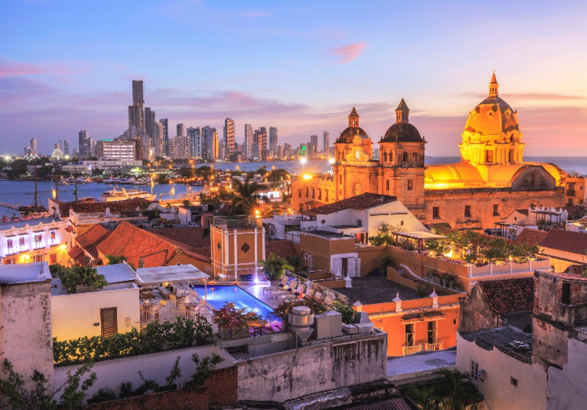 The sun setting over Cartagena, with the cathedral and skyline in view