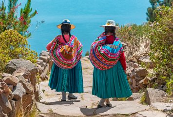 Two,Indigenous,Quechua,Women,In,Traditional,Clothes,Walking,Down,The