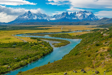 River meandering towards mountains in Torres Del Paine