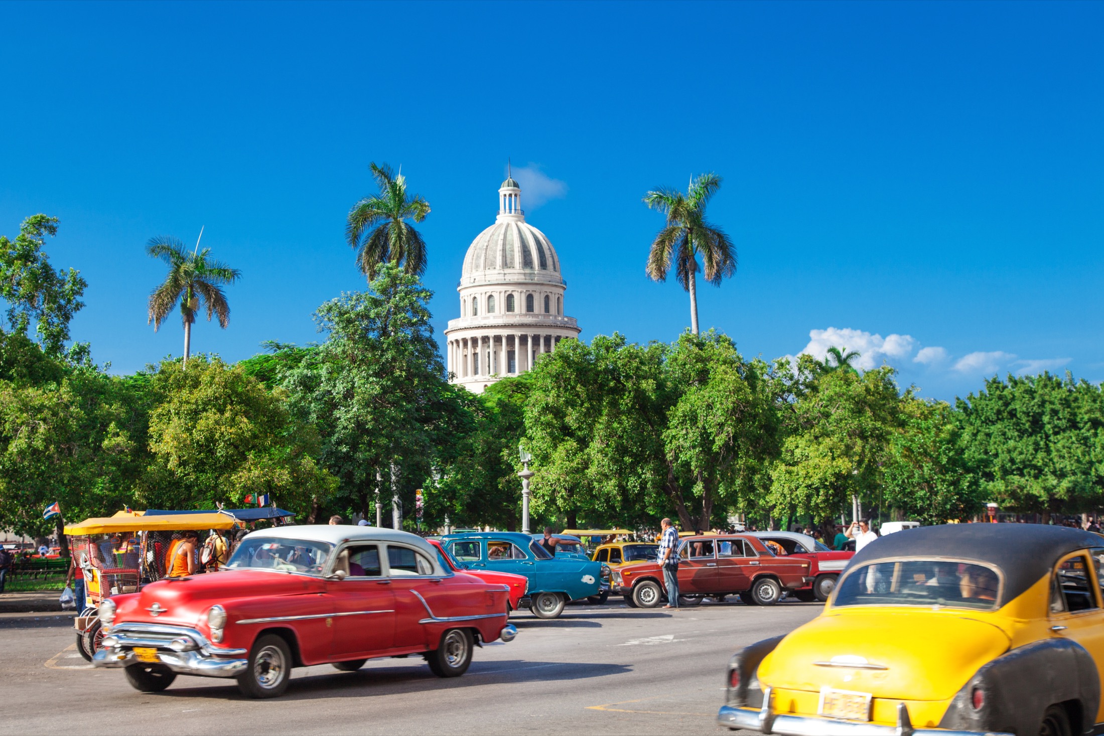 Colourful cars driving in Havana, Cuba