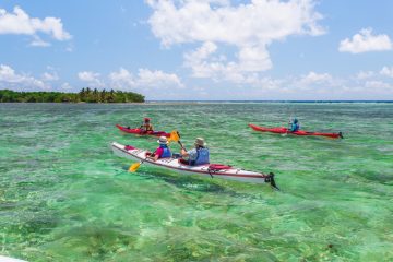 Kayaking through Glovers Reef