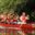Group paddling on a river in a canoe