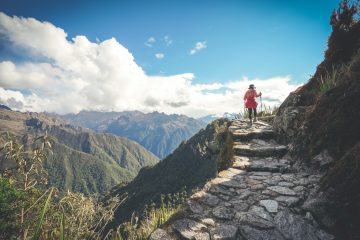 Hiker walking up the trail to Machu Picchu