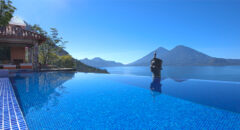 Infinity swimming pool with mountain backdrop