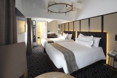 Guest room with two beds at Casa Andina Premium Collection Cusco