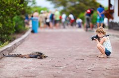 GPS_GirlphotographingIguana_shutterstock126538988_freewithcredit