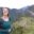 Woman smiling in front of Machu Picchu in Peru